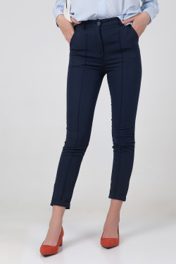 Women's dark blue office trousers with creases, made of suiting fabric . Dark blue.