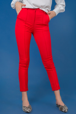 Women's red office trousers made of suiting fabric with creases . Red.