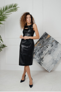 Black faux leather Evening dress with a striking neckline . Black. Черный