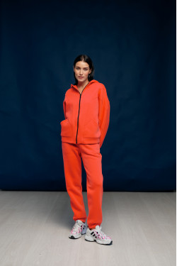 Спортивные брюки на флисе оранжевого цвета с манжетами Оранжевый